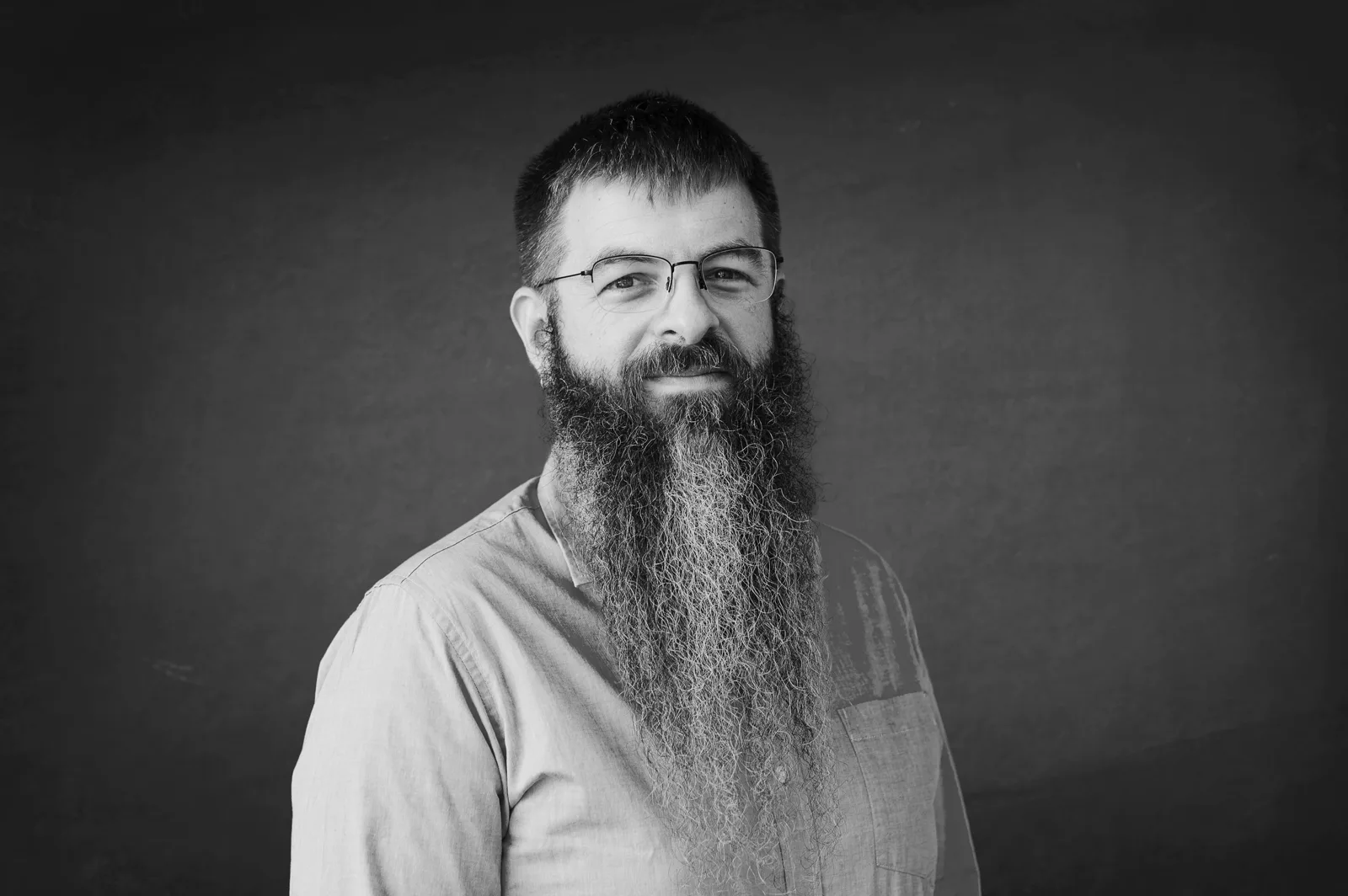Justin McCarthy black-and-white landscape headshot