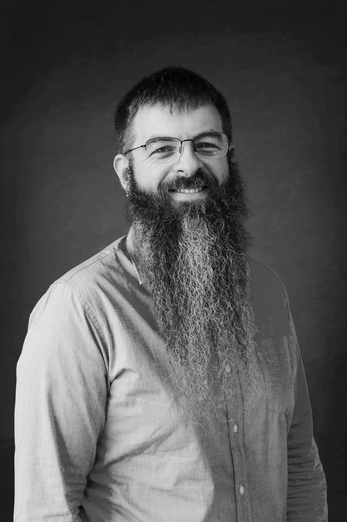Justin McCarthy black-and-white portrait headshot